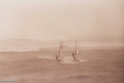 Surfers in a storm