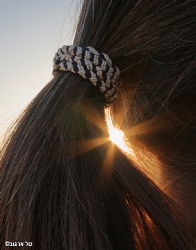 קרן שמש מאוחרת בשיערך